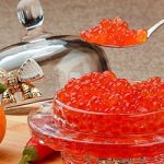 Red caviar on the table